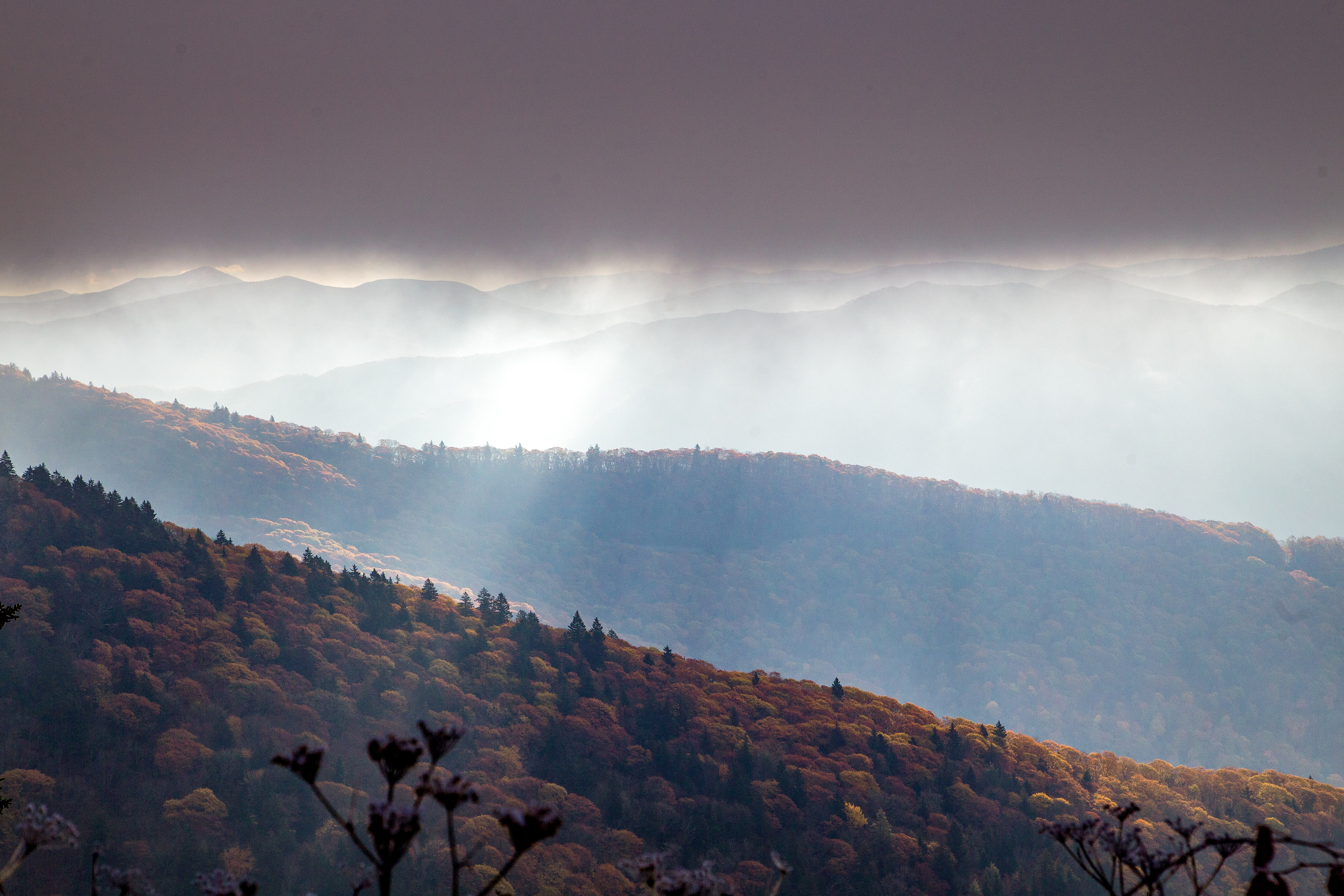 Sun beams through clouds over the Smoky Mountains
